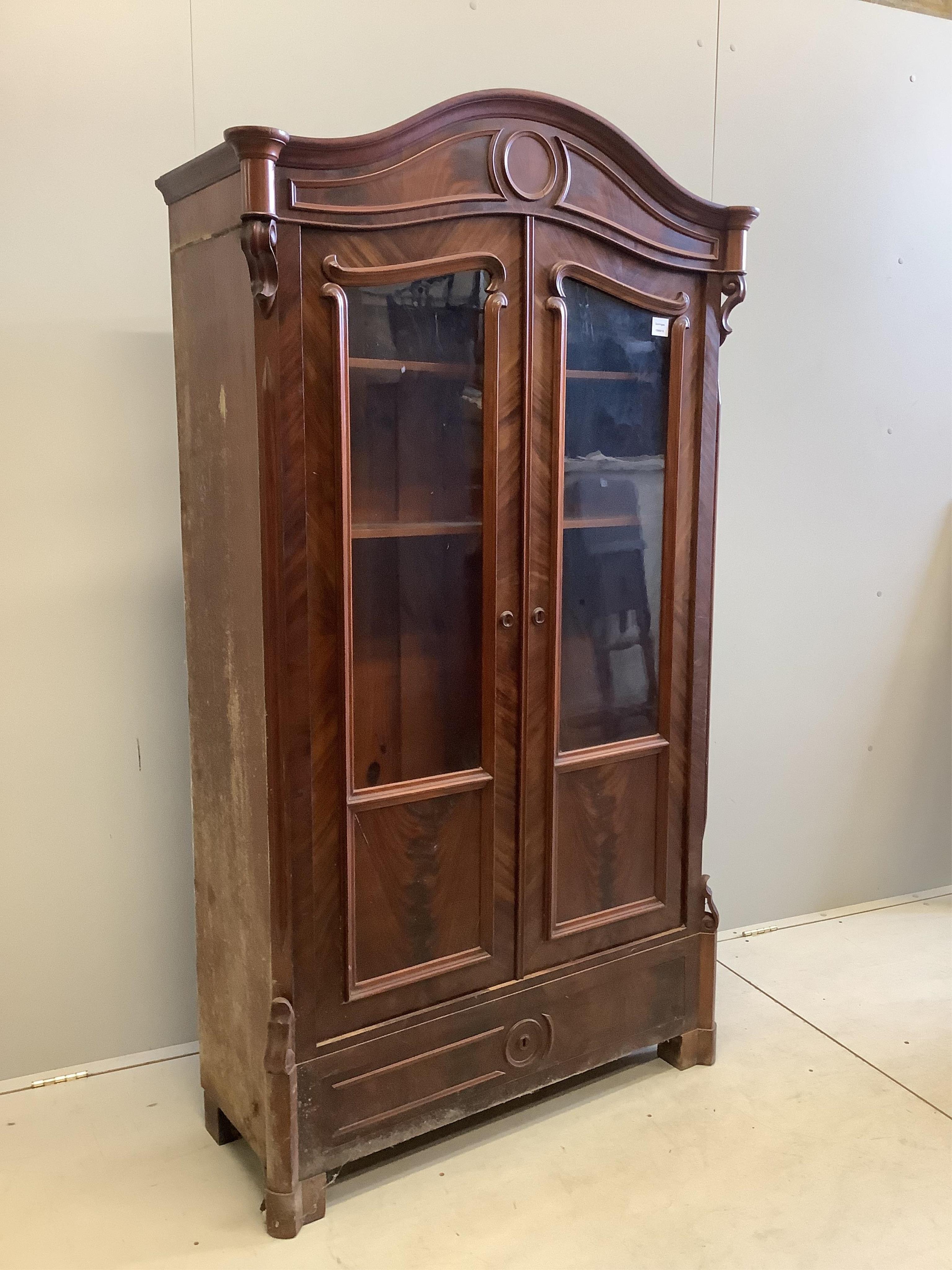 A small 19th century French glazed mahogany armoire, width 104cm, depth 41cm, height 186cm. Condition - fair